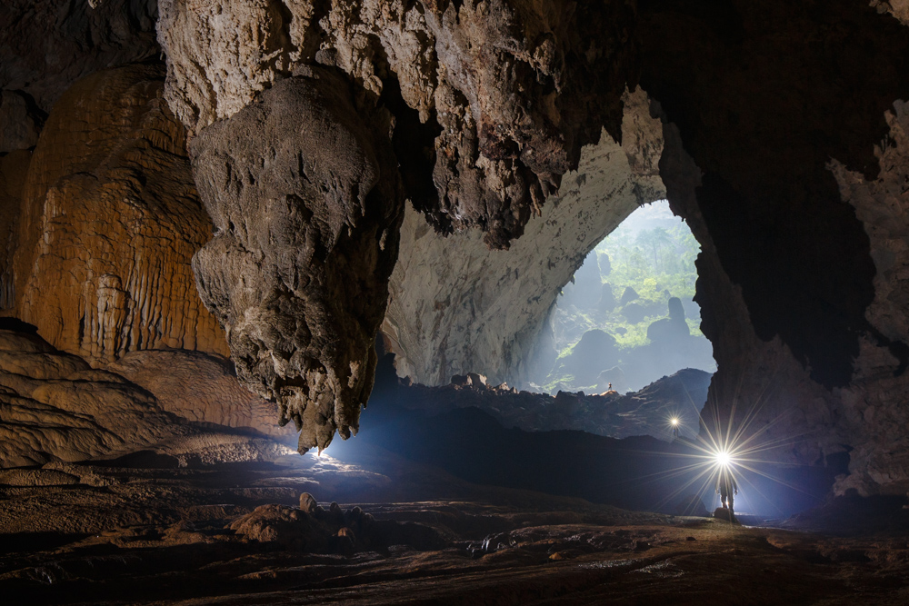 Cavers walk away from the second doline in Hang Son Doong, Phong Nha Ke Bang, Vietnam